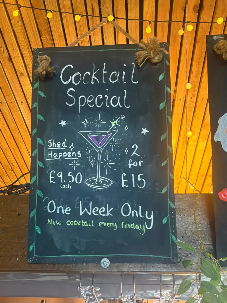 Cocktail specials chalkboard at The Shed