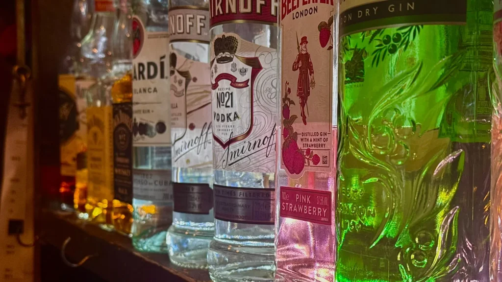 Vodka and gin bottles behind the bar